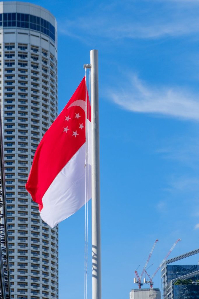 Aerial view of modern Singapore skyline showcasing the global financial hub evolution